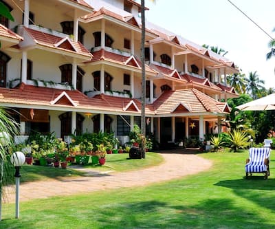 https://imgcld.yatra.com/ytimages/image/upload/t_hotel_yatra_city_desktop/v1442233090/Domestic Hotels/Hotels_Varkala/The Sanctum Spring Beach Resort/Overview.jpg